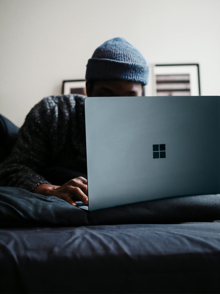 Person using a Microsoft Surface laptop